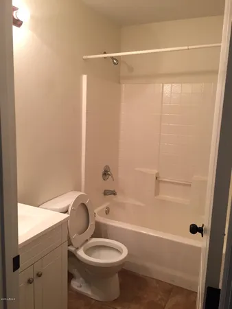a bathroom with a sink and a bathtub