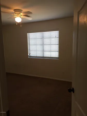 a view of a livingroom with a fan