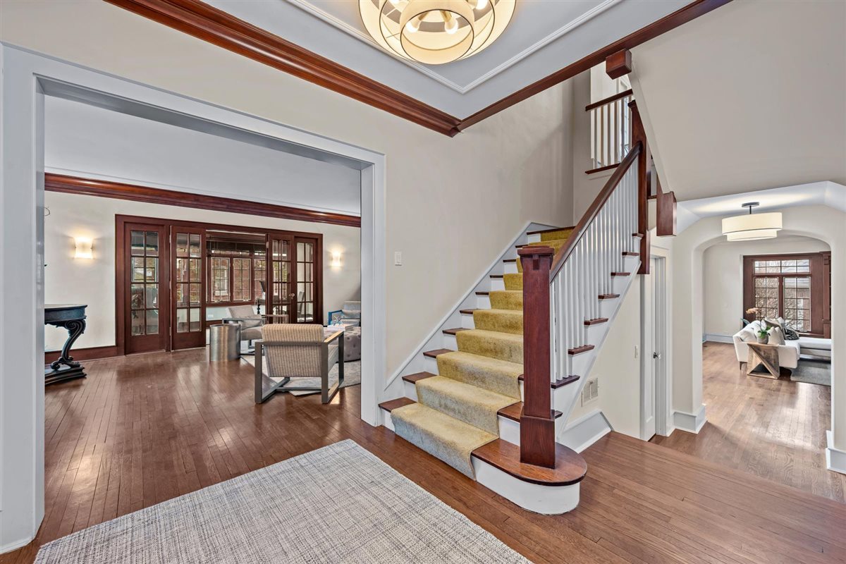 224 Sheridan Road Kenilworth, IL 60043 - Photo 15 of 62 a view of entryway livingroom and hall with wooden floor