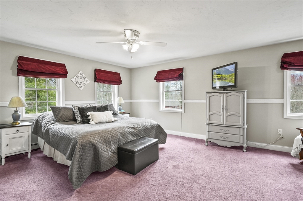 173 Oakham Road North Brookfield, MA 01535 - Photo 14 of 30 a bedroom with a bed and a dresser