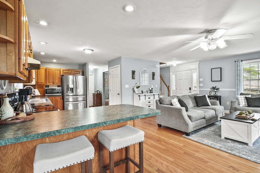 173 Oakham Road North Brookfield, MA 01535 - Photo 6 of 30 a living room with furniture and wooden floor