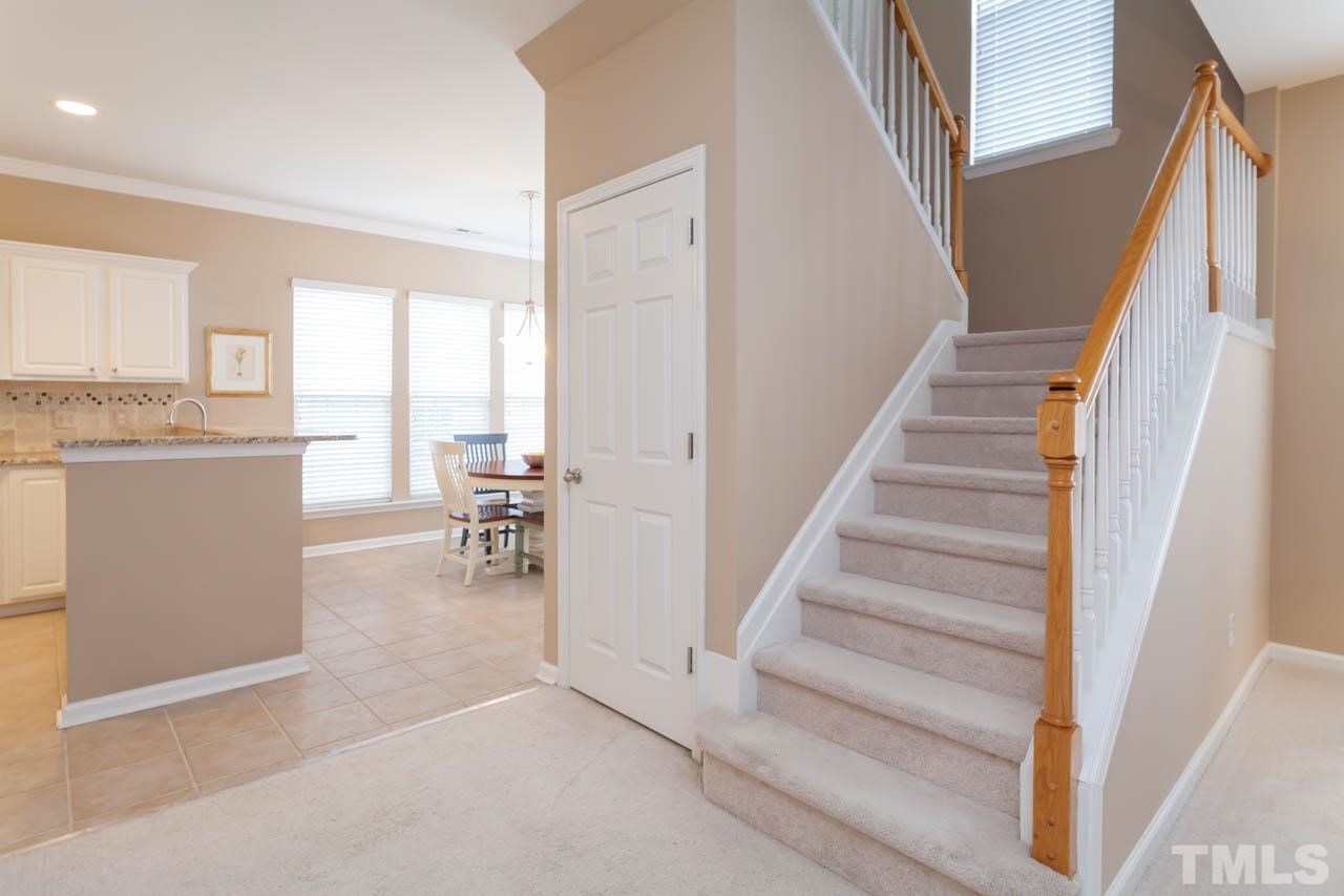 7472 Silver View Lane Raleigh, NC 27613 - Photo 11 of 25 a view of a livingroom with furniture and stairs