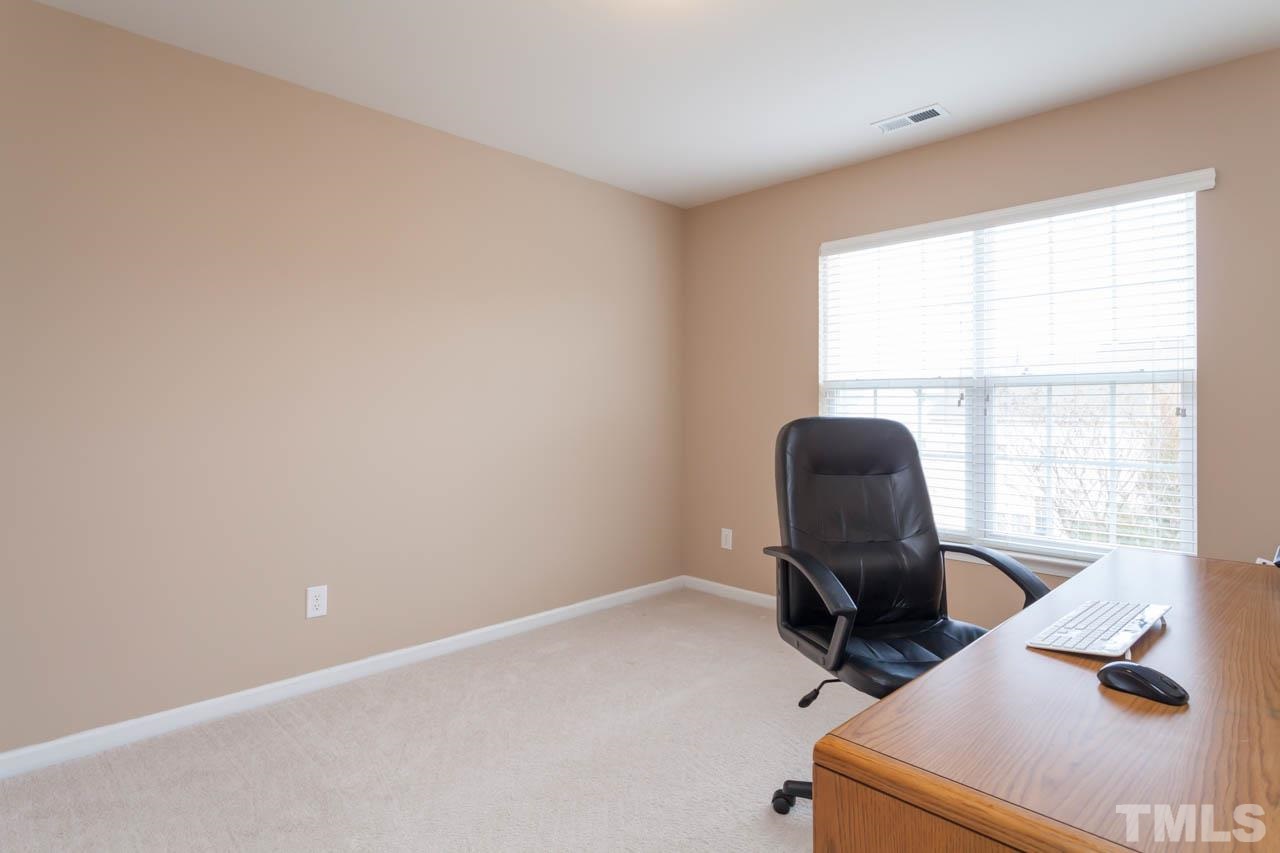 7472 Silver View Lane Raleigh, NC 27613 - Photo 16 of 25 a view of workspace with windows
