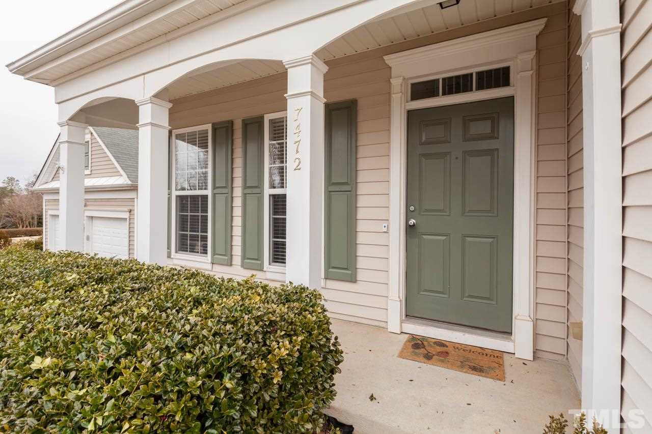 7472 Silver View Lane Raleigh, NC 27613 - Photo 3 of 25 front view of a house with a door