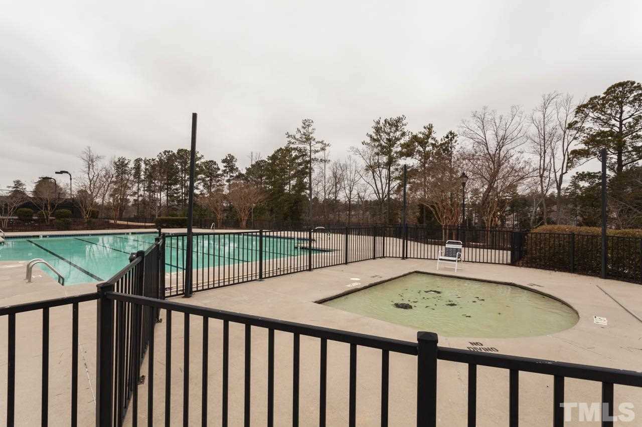 7472 Silver View Lane Raleigh, NC 27613 - Photo 22 of 25 a view of swimming pool with a backyard