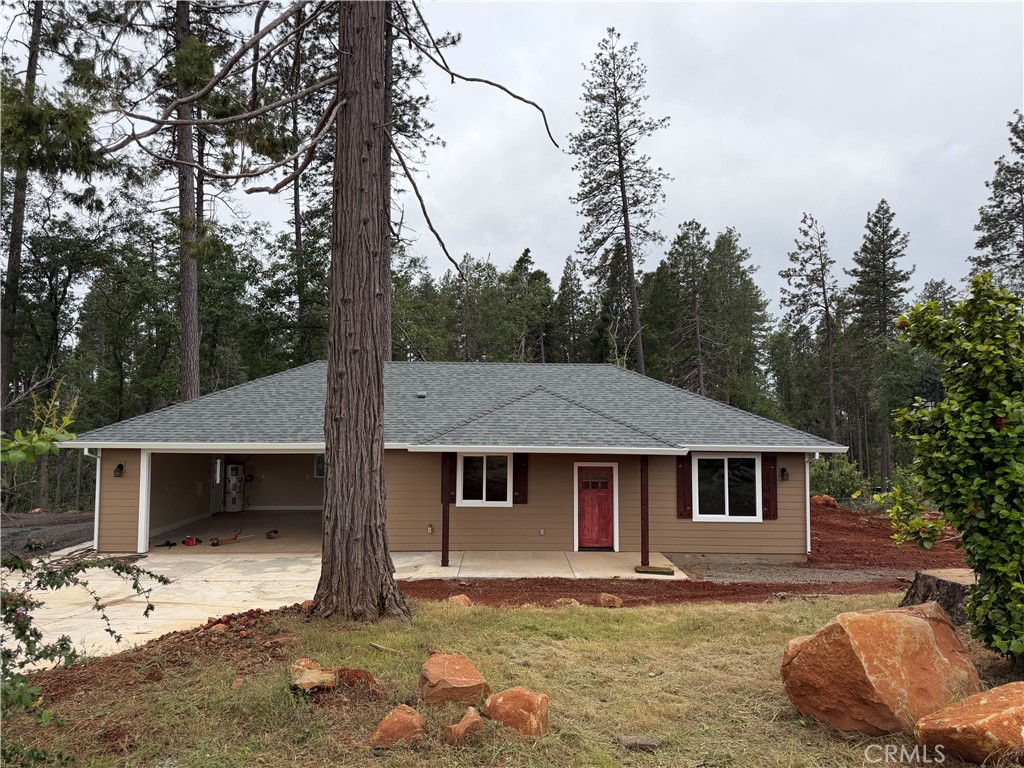 1796 Forest Glen Road Paradise, CA 95969 - Photo 1 of 1 a front view of a house with a yard and garage
