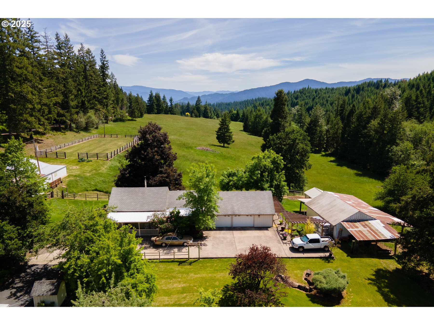 an aerial view of a house with a garden