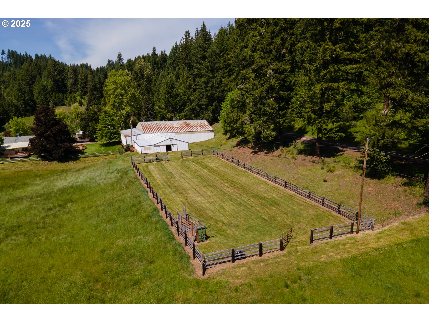 77690 Brock Road Oakridge, OR 97463 - Photo 3 of 45 a view of a swimming pool with a yard