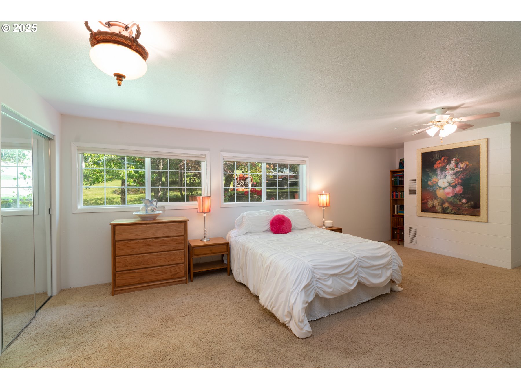 77690 Brock Road Oakridge, OR 97463 - Photo 37 of 45 a bedroom with a bed and wooden floor