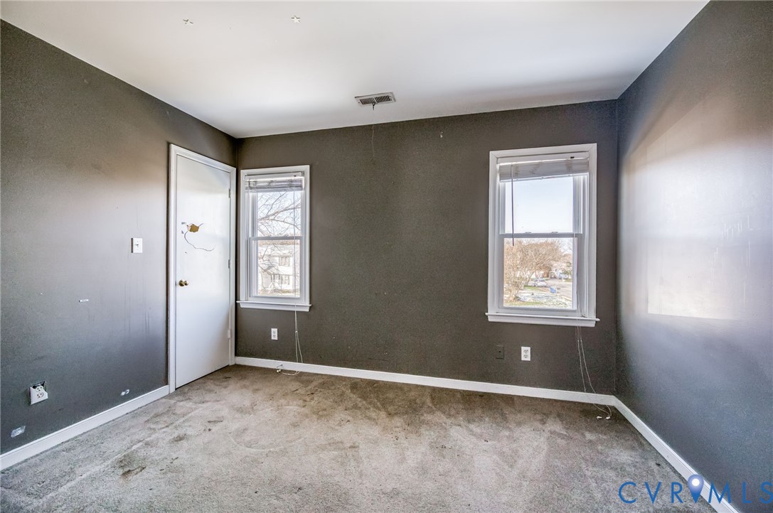 9301 Brocket Drive Midlothian, VA 23112 - Photo 17 of 27 a view of an empty room with a window