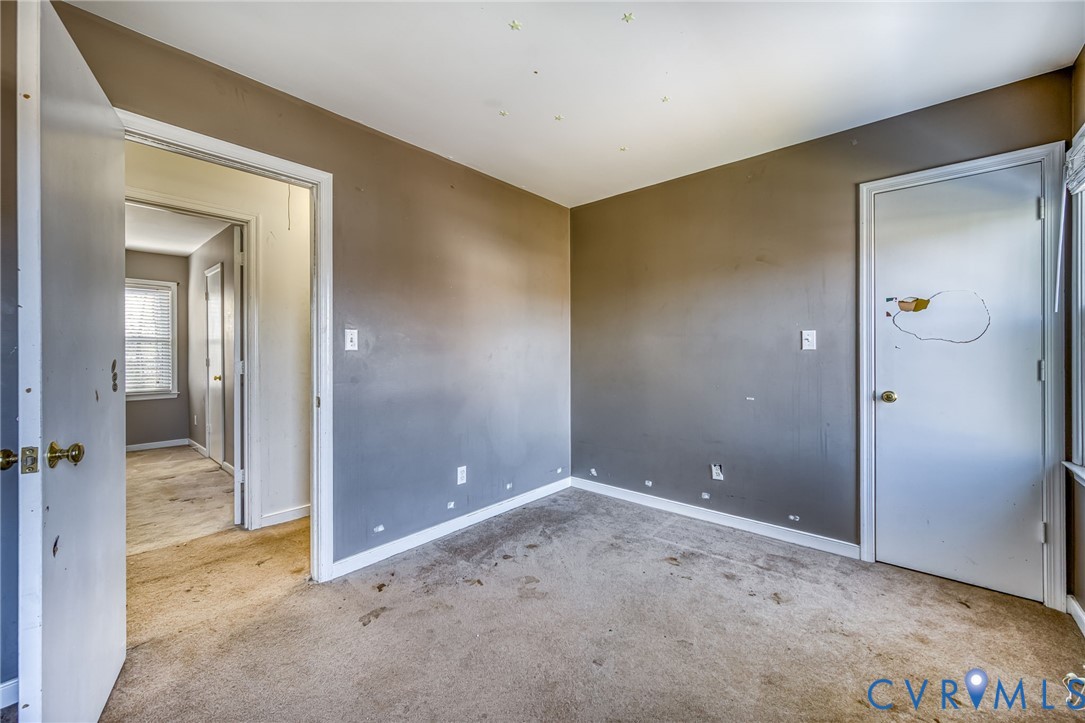 9301 Brocket Drive Midlothian, VA 23112 - Photo 18 of 27 wooden floor and chair in a room