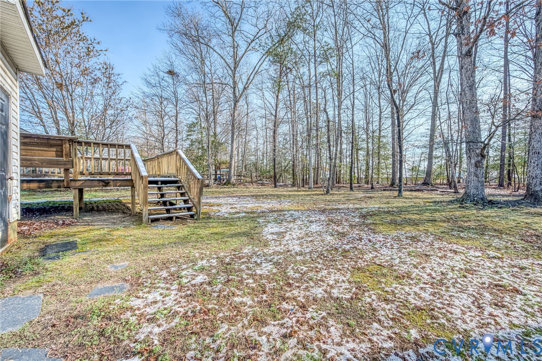 9301 Brocket Drive Midlothian, VA 23112 - Photo 25 of 27 a view of outdoor space with deck and trees