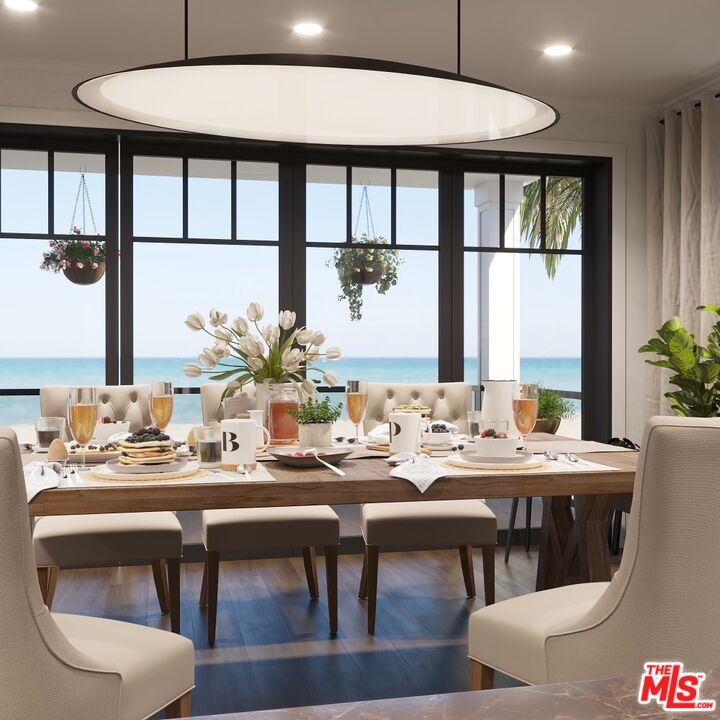 941 Mandalay Beach Road Oxnard, CA 93035 - Photo 8 of 11 a view of a dining room with furniture window and outside view