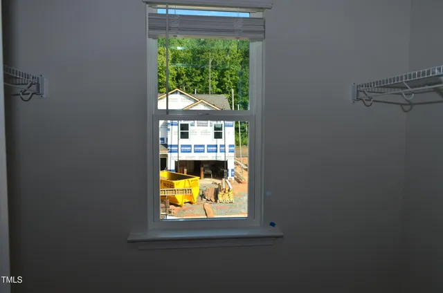 a view of a window with a small kitchen