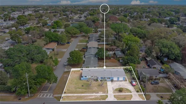 an aerial view of house with outdoor space