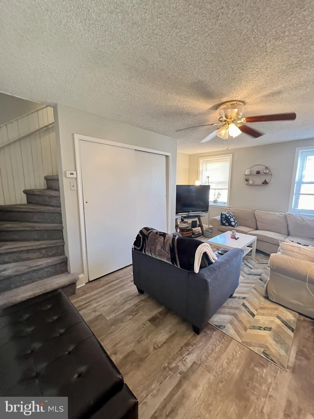 125 Maple Street Conshohocken, PA 19428 - Photo 12 of 32 a living room with furniture and a fireplace