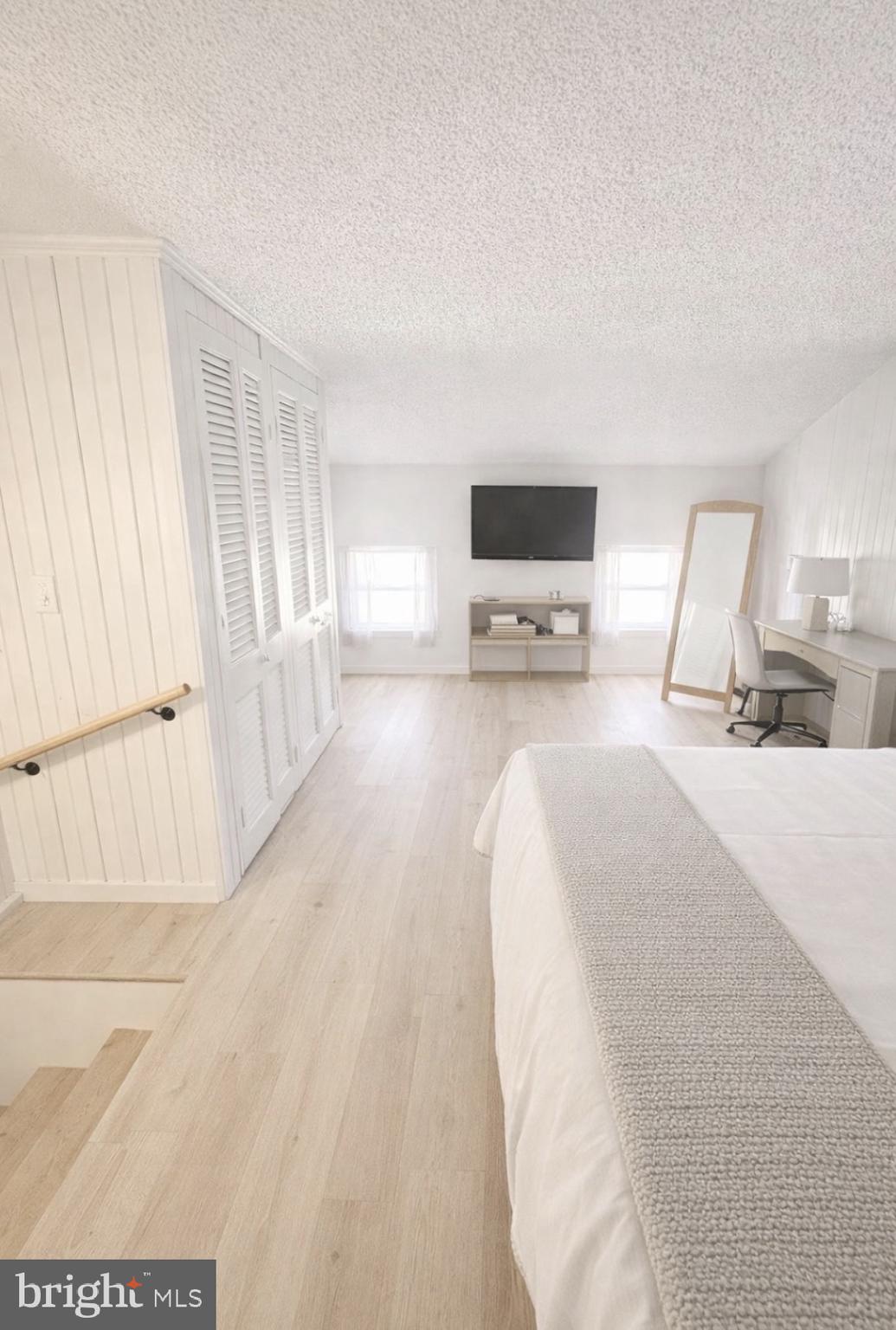 125 Maple Street Conshohocken, PA 19428 - Photo 15 of 20 a large white bed in a white room