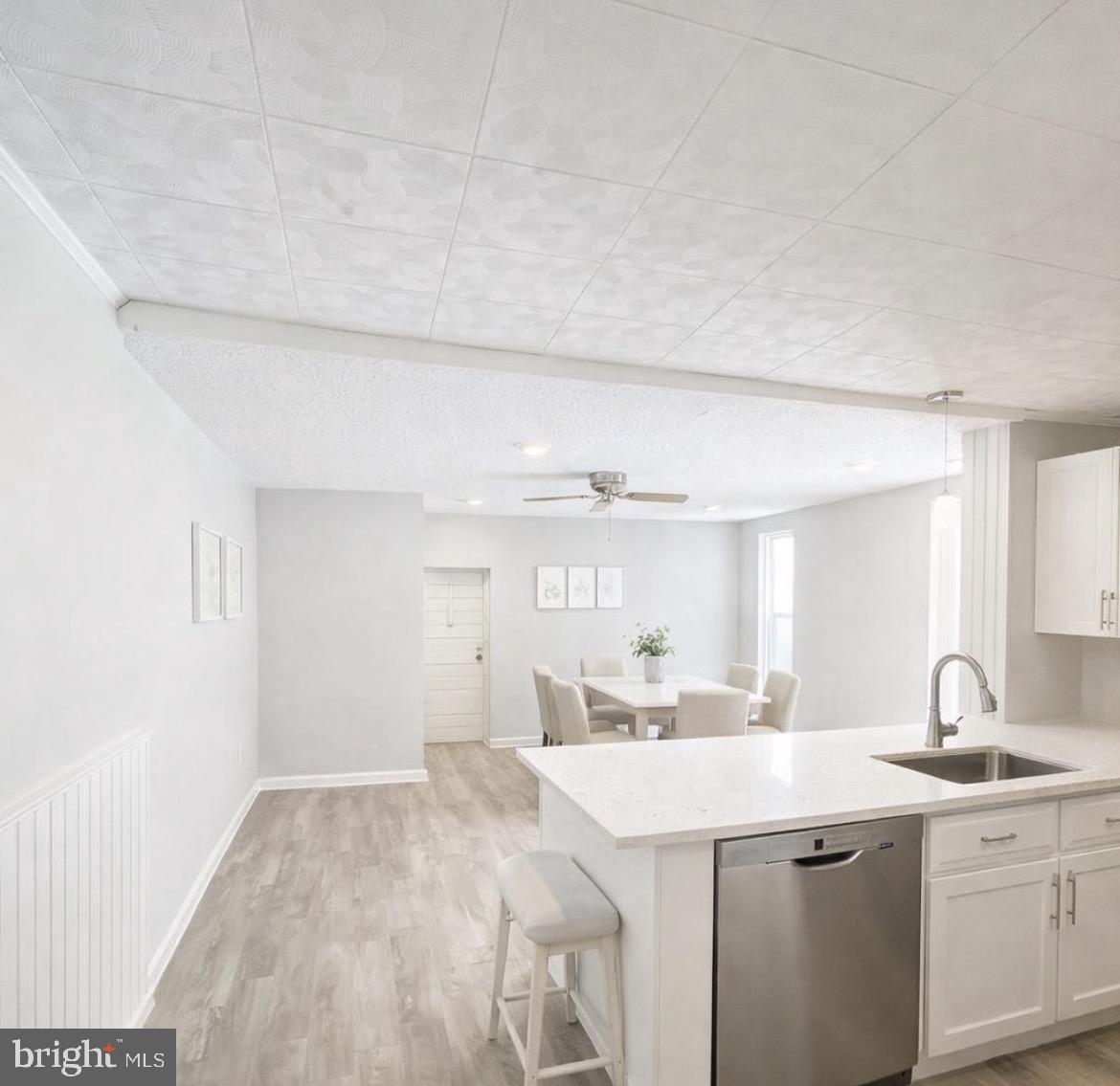 125 Maple Street Conshohocken, PA 19428 - Photo 4 of 20 a kitchen with a sink cabinets and window