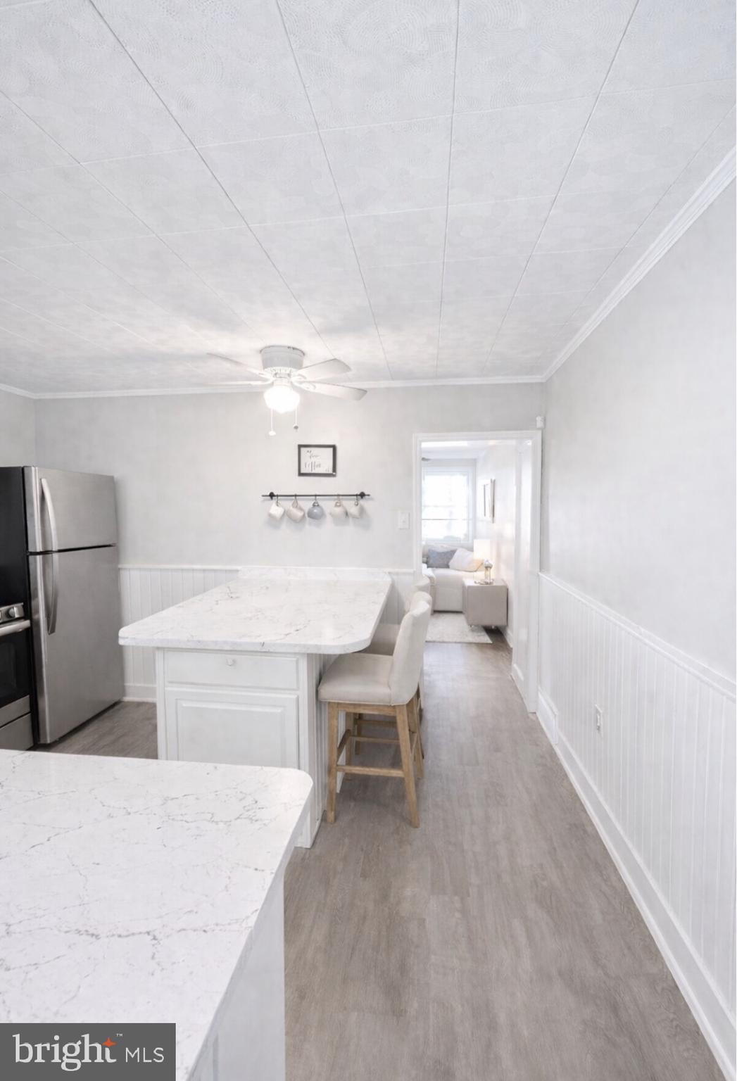 125 Maple Street Conshohocken, PA 19428 - Photo 6 of 20 a living room with furniture and a table