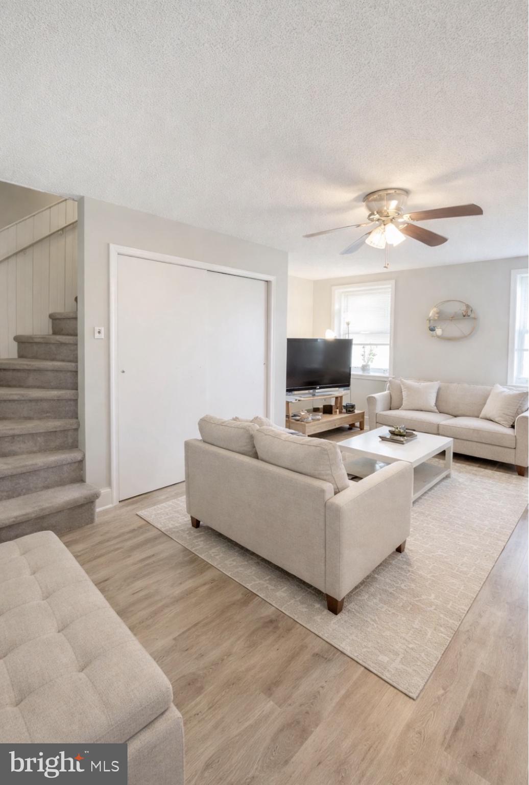 125 Maple Street Conshohocken, PA 19428 - Photo 7 of 20 a living room with furniture and a flat screen tv