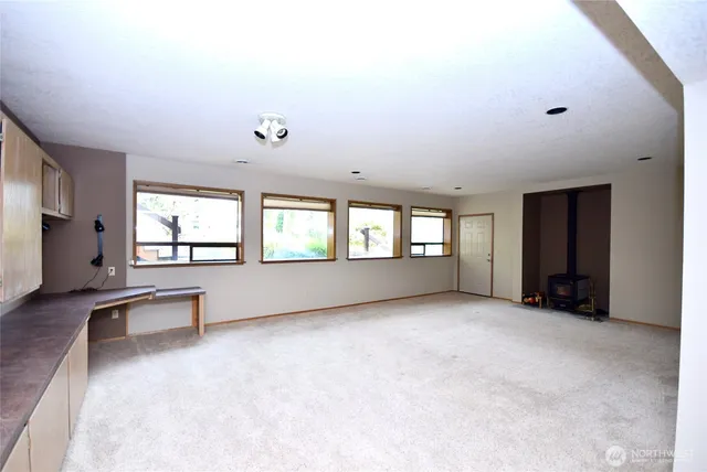 an empty room with windows