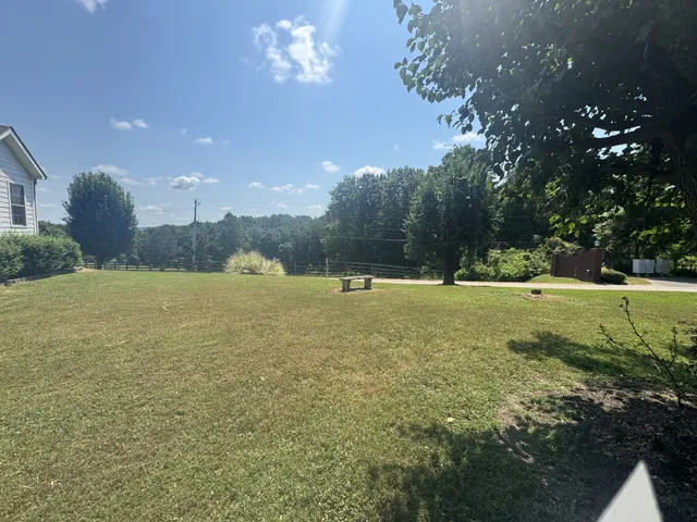 a view of a garden and basketball court