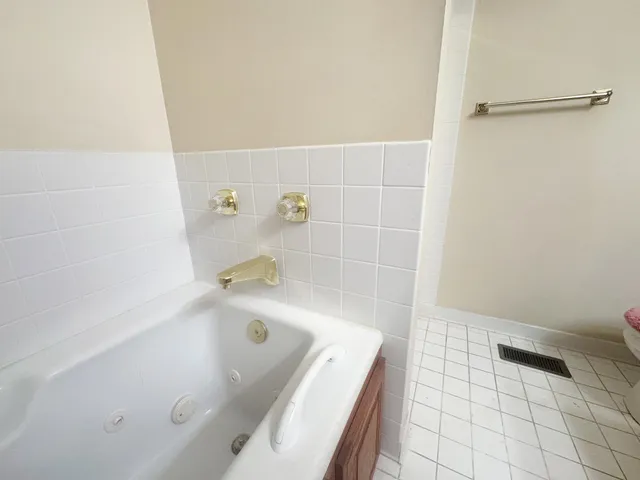 a bathroom with a bathtub