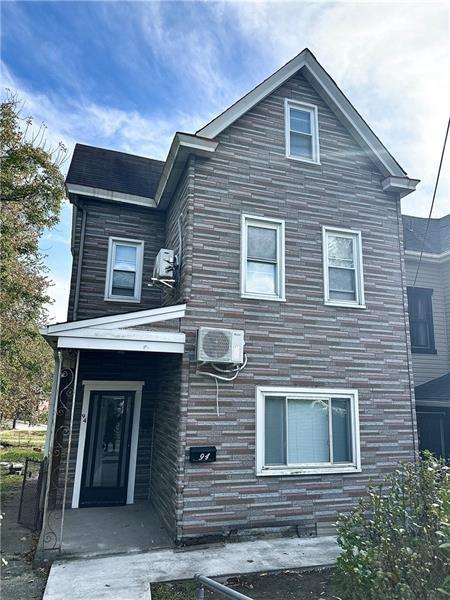 94 Lafferty Avenue Pittsburgh, PA 15210 - Photo 1 of 17 a front view of a house