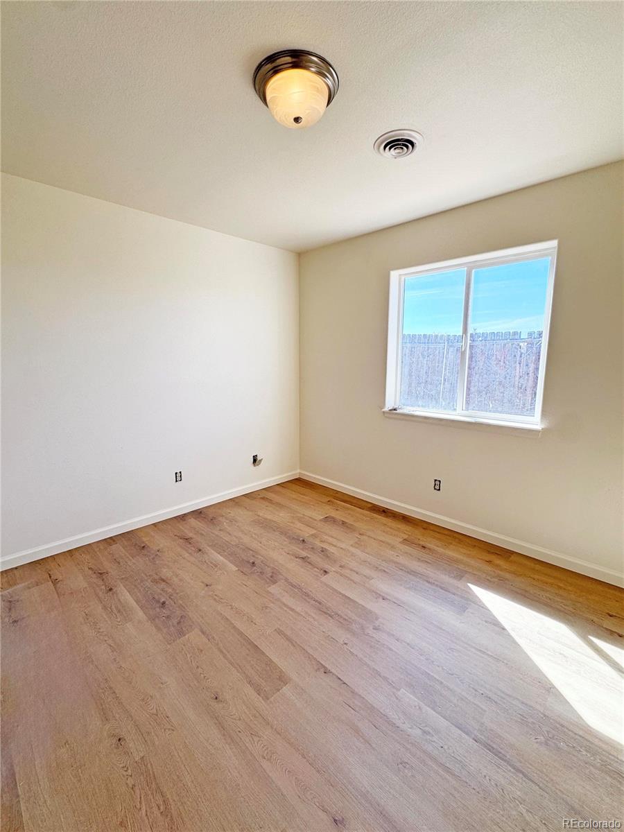 1041 Halfturn Road Rangely, CO 81648 - Photo 9 of 11 an empty room with a window