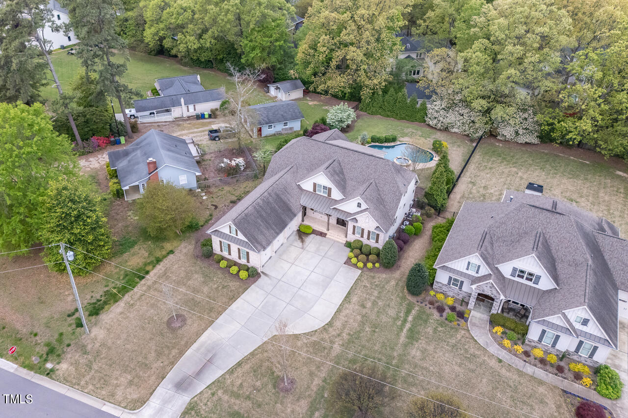 3601 Laurel Hills Road Raleigh, NC 27612 - Photo 14 of 77 an aerial view of a house with outdoor space