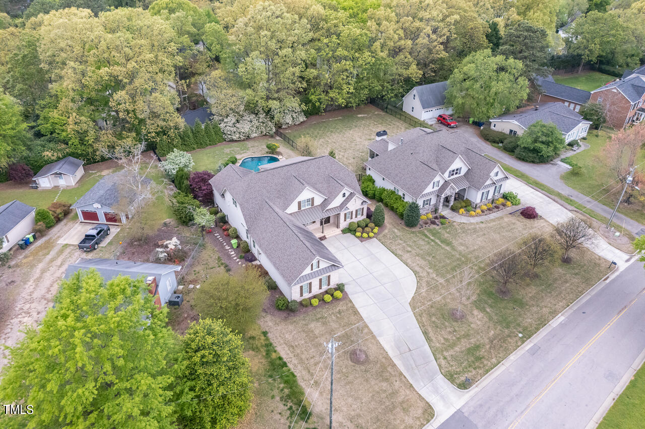 3601 Laurel Hills Road Raleigh, NC 27612 - Photo 15 of 77 an aerial view of a house with a yard