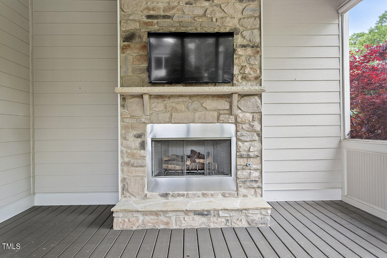 3601 Laurel Hills Road Raleigh, NC 27612 - Photo 19 of 77 a living room with a fireplace