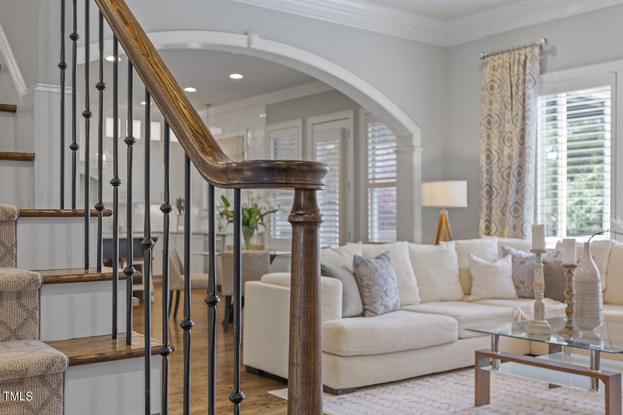 3601 Laurel Hills Road Raleigh, NC 27612 - Photo 20 of 77 a living room with furniture and a large window