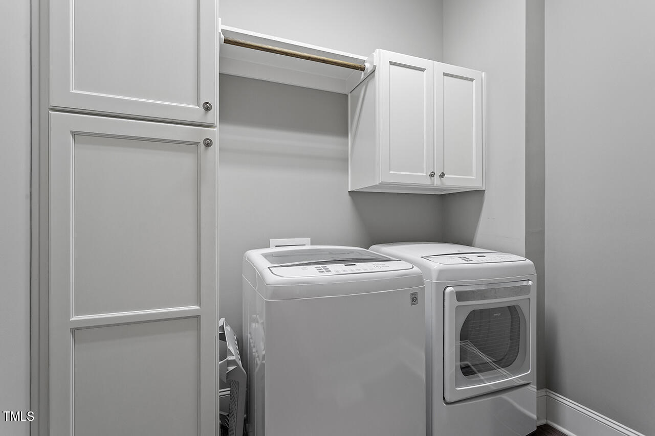 3601 Laurel Hills Road Raleigh, NC 27612 - Photo 52 of 77 a utility room with dryer and washer