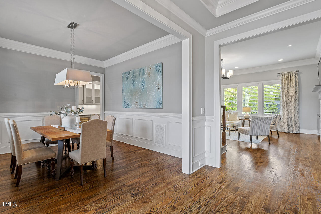 3601 Laurel Hills Road Raleigh, NC 27612 - Photo 10 of 77 a dining room with furniture window wooden floor