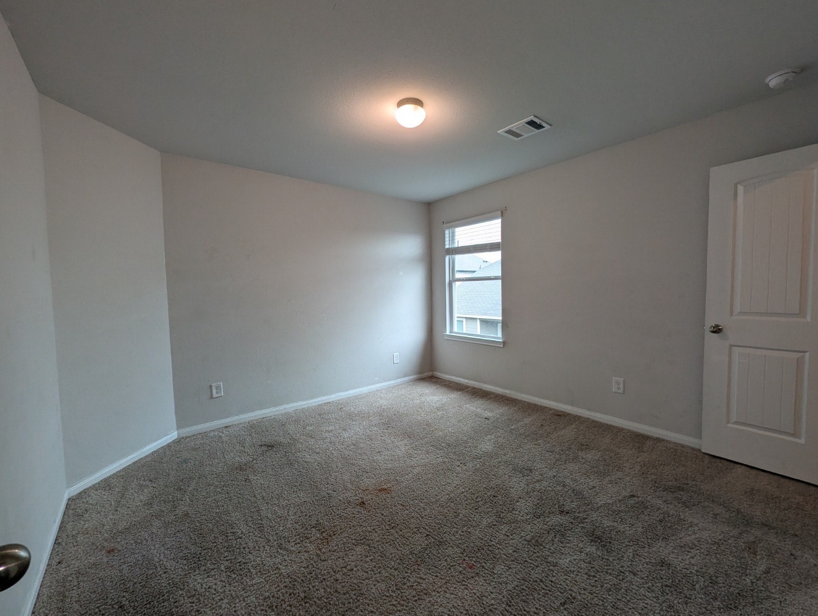 23634 Buttress Root Drive Spring, TX 77373 - Photo 3 of 14 a view of an empty room with a window