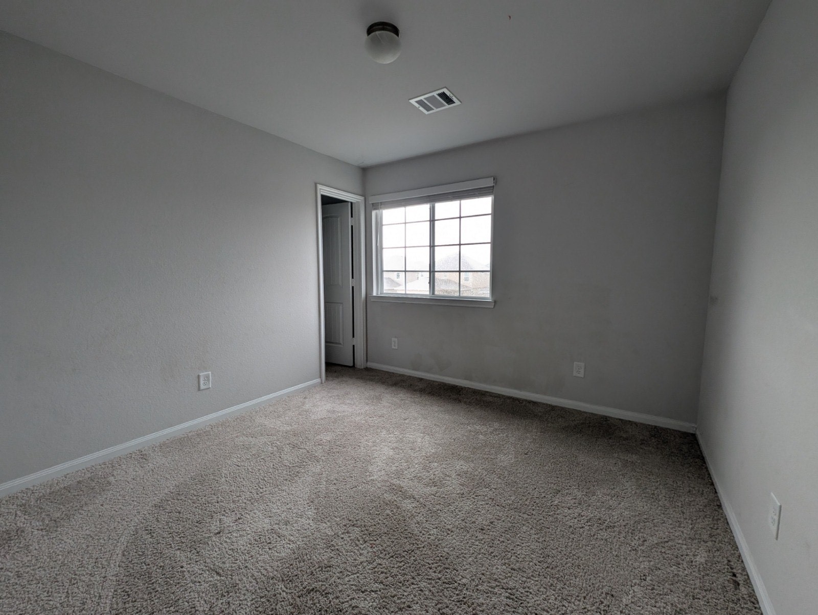 23634 Buttress Root Drive Spring, TX 77373 - Photo 4 of 14 an empty room with a window