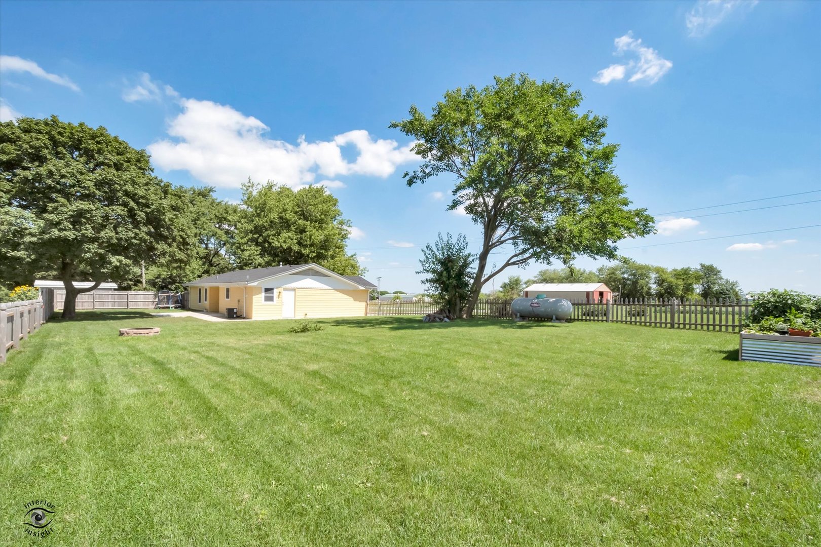 27924 South Scheer Road Peotone, IL 60468 - Photo 27 of 27 a front view of a house with garden
