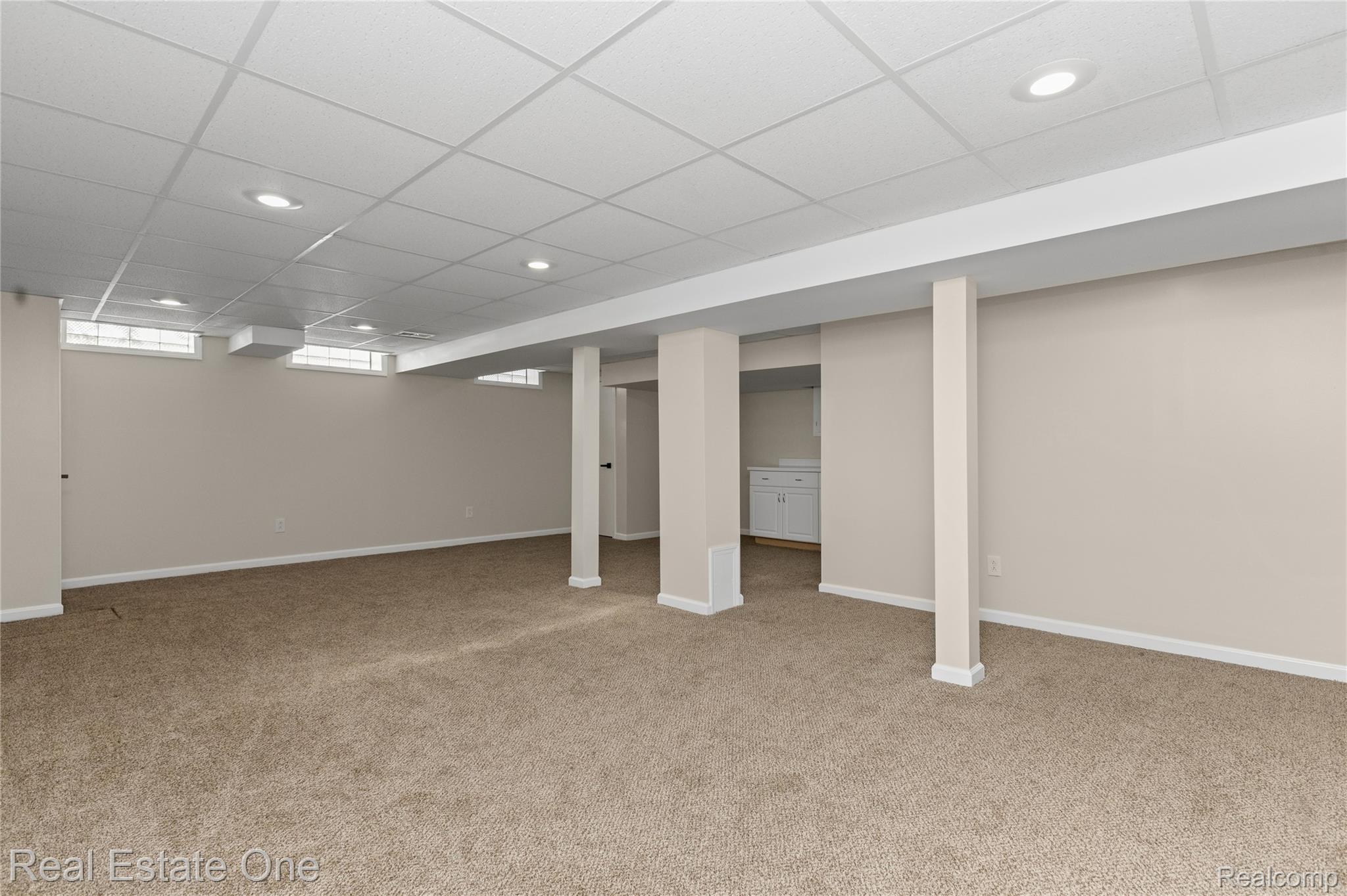 25695 Branchaster Road Farmington, MI 48336 - Photo 44 of 58 Expansive carpeted area with recessed lighting, drop ceiling, and neutral-toned walls