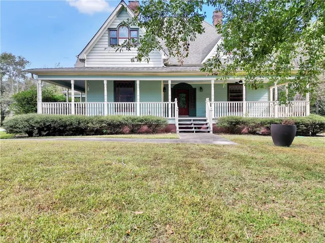 front view of a house with a garden