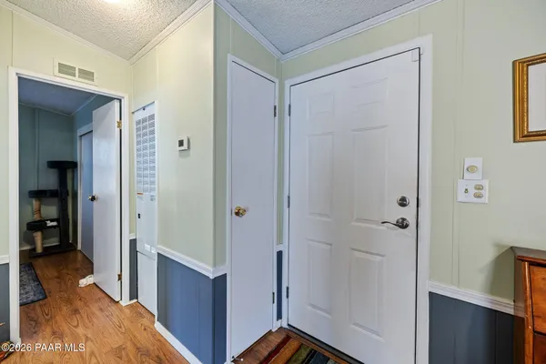 a view of a hallway to other door