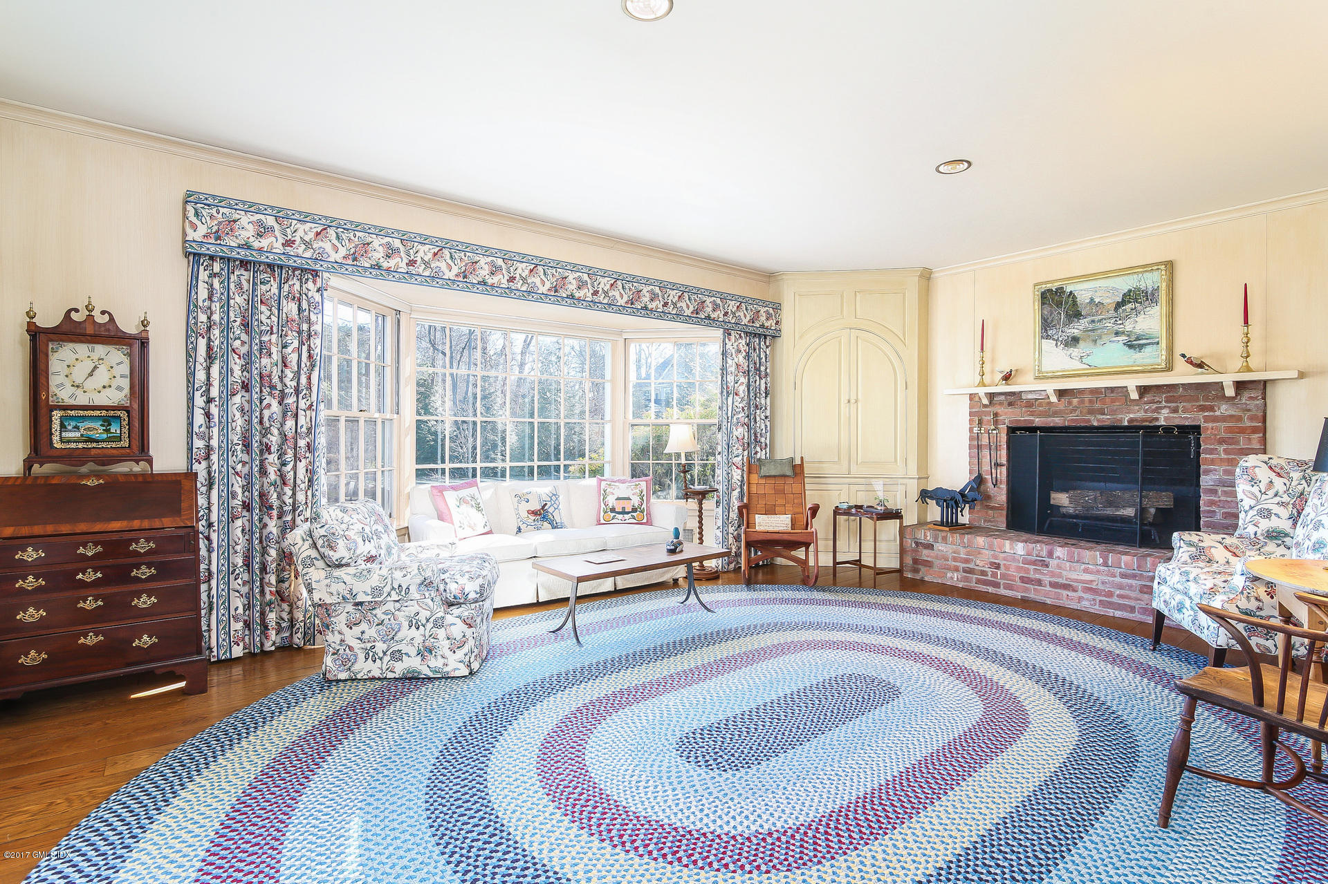 15 Beechcroft Road Greenwich, CT 06830 - Photo 11 of 21 a living room with furniture and a fireplace