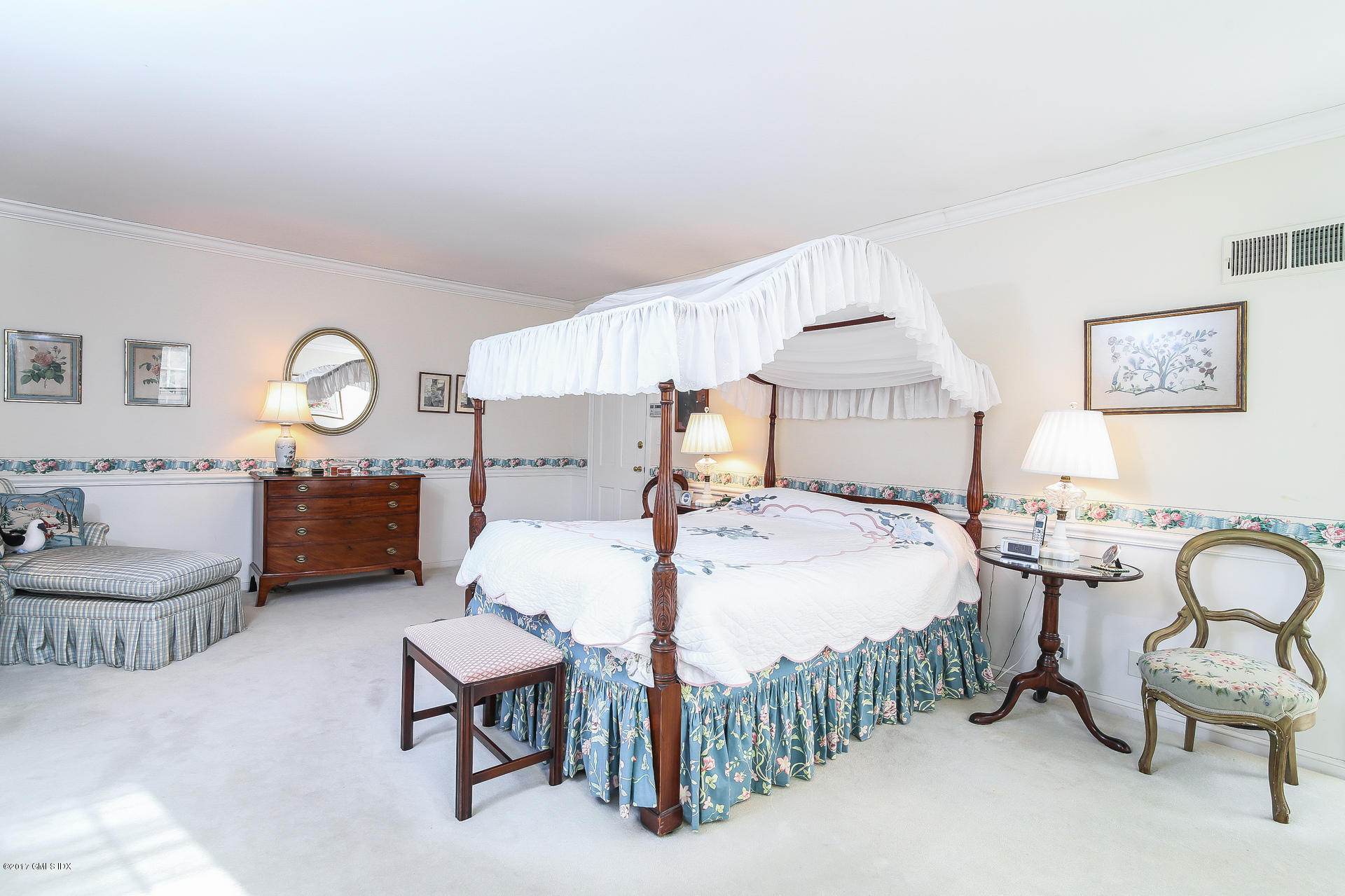 15 Beechcroft Road Greenwich, CT 06830 - Photo 12 of 21 a bed room with a bed and chair