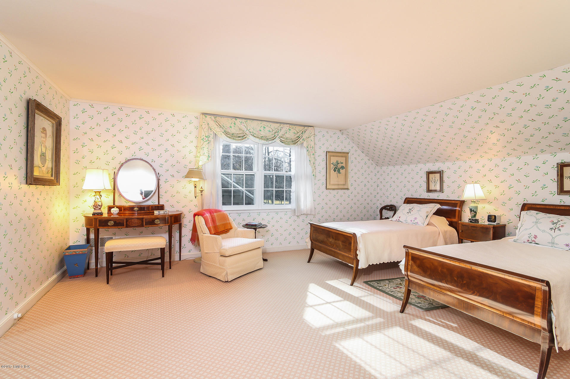 15 Beechcroft Road Greenwich, CT 06830 - Photo 13 of 21 a bedroom with furniture and a window