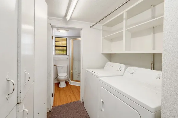 a utility room with dryer and washer