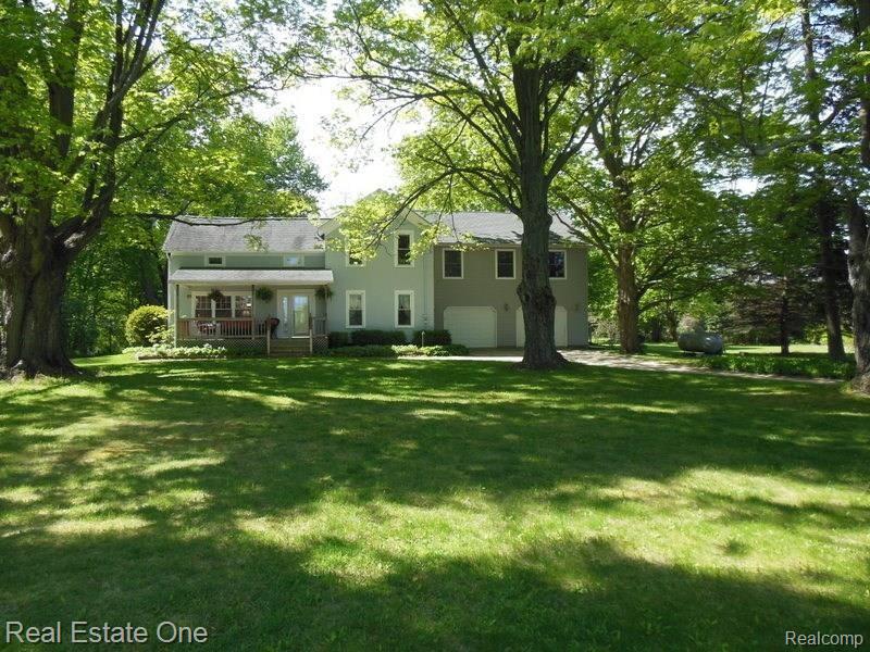 4747 Deal Road Fowlerville, MI 48836 - Photo 3 of 54 Mature trees