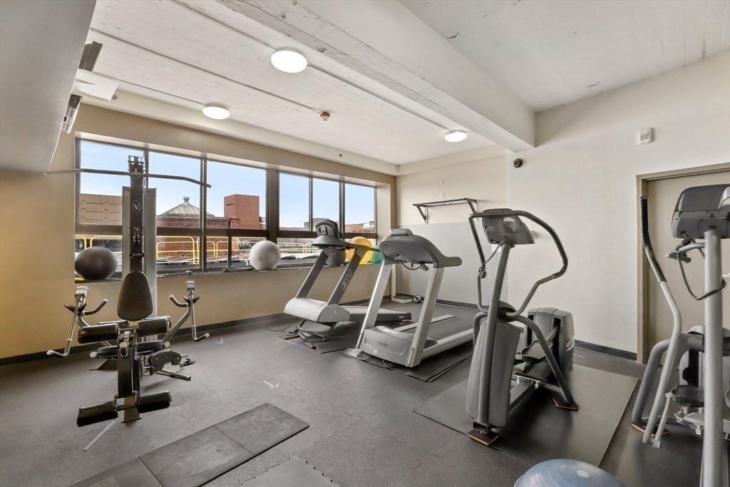 12 Stoneholm Street, Unit 406 Boston, MA 02115 - Photo 9 of 11 a view of a room with gym equipment