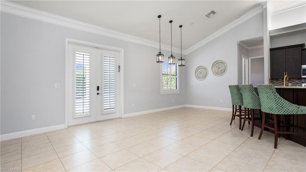 6341 Green Boulevard Naples, FL 34116 - Photo 22 of 48 a view of a livingroom with furniture and window