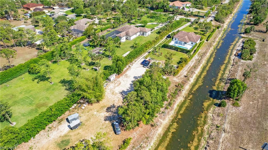 6341 Green Boulevard Naples, FL 34116 - Photo 43 of 48 View of property location with a large body of water and nearby suburban area
