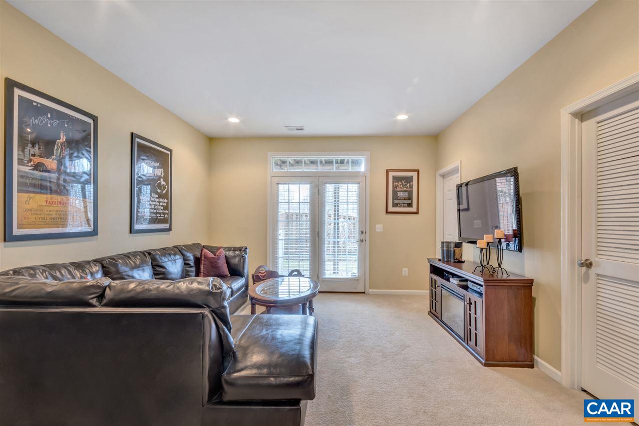 829 Rainier Road Charlottesville, VA 22903 - Photo 15 of 16 a living room with furniture and large window